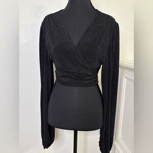Seek the Label Black Wrap Top knit size Medium
Billow sleeves